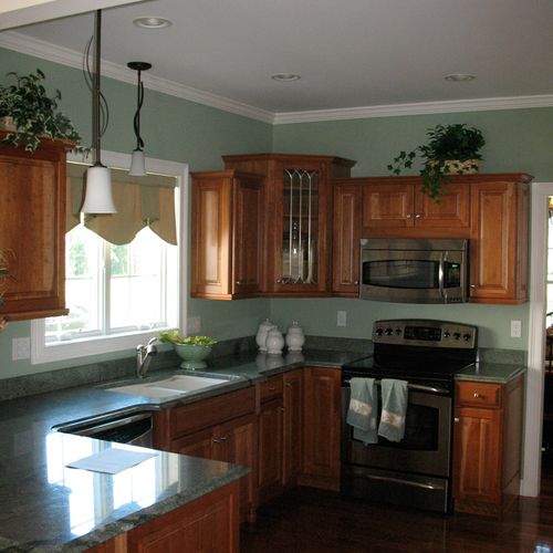 NEW ENGLAND KITCHEN FEATURING CHERRY CABINETRY