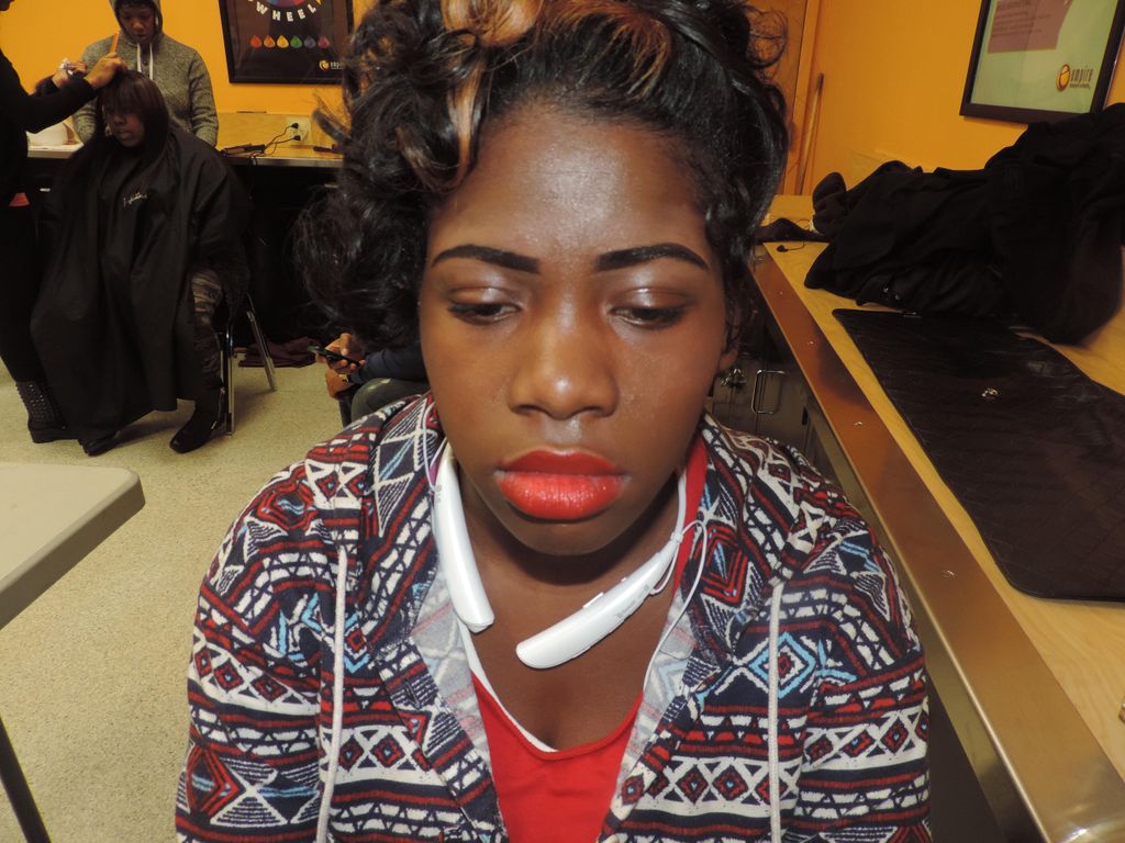 Eyebrow waxing and filling.