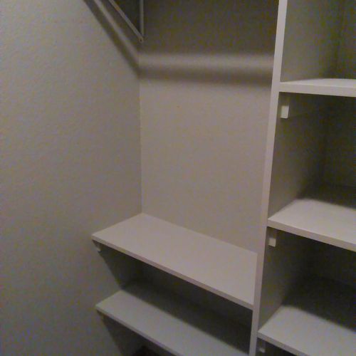 Turned an empty alcove into a pantry and shelf/pol