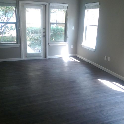 Apartment Remodel: Installed vinyl plank flooring,