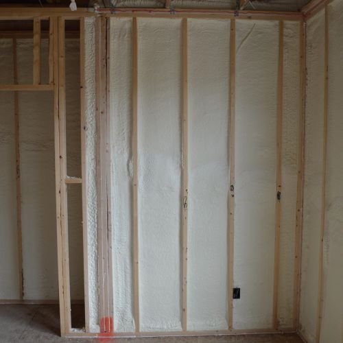Wall insulation with spray foam