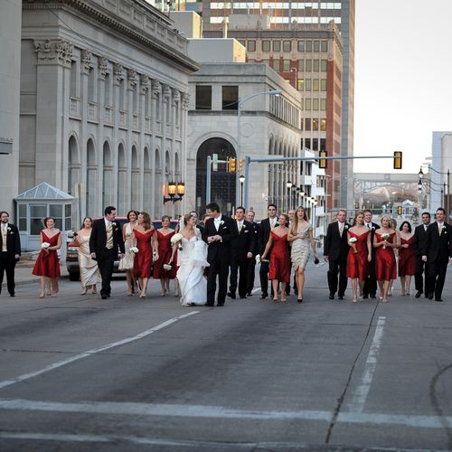 The wedding party marches down the center of Oklah
