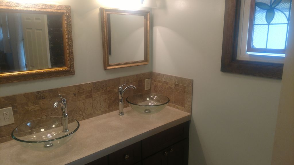 double vessel sinks on concrete countertops