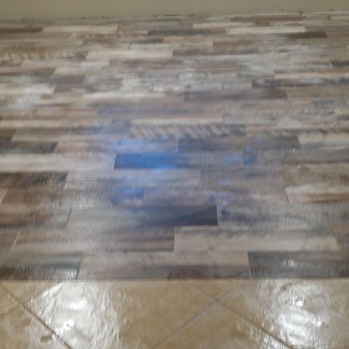 Plank Flooring ( Tile that looks like wood)