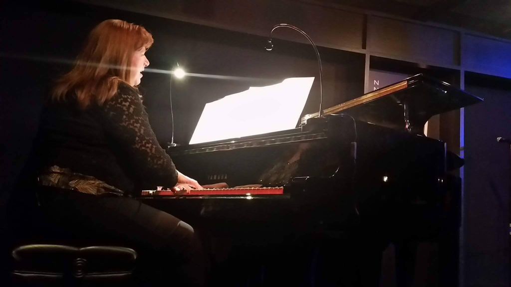 Playing and singing at Dazzle Jazz Club 2017