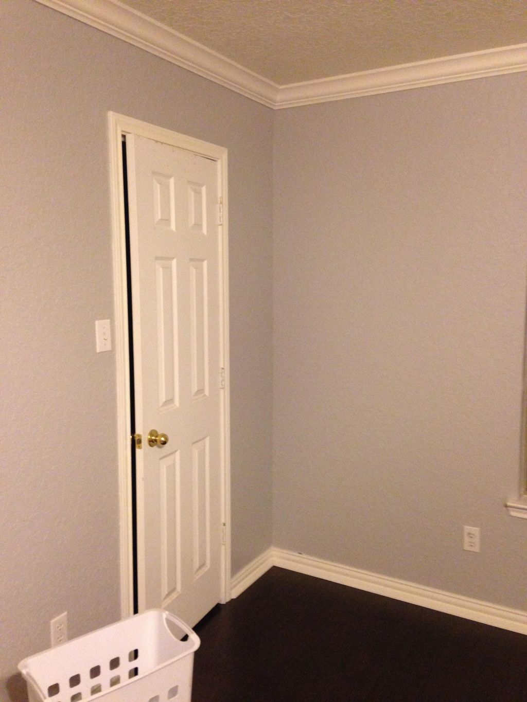 Flooring installed with new base boards and crown 