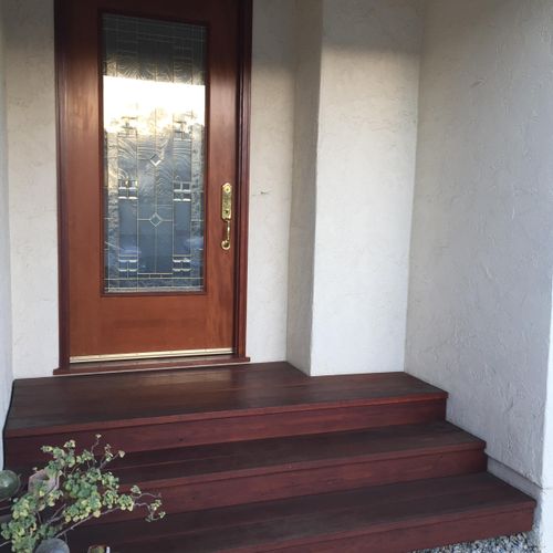 Exterior door and frame with brass hardware, steps