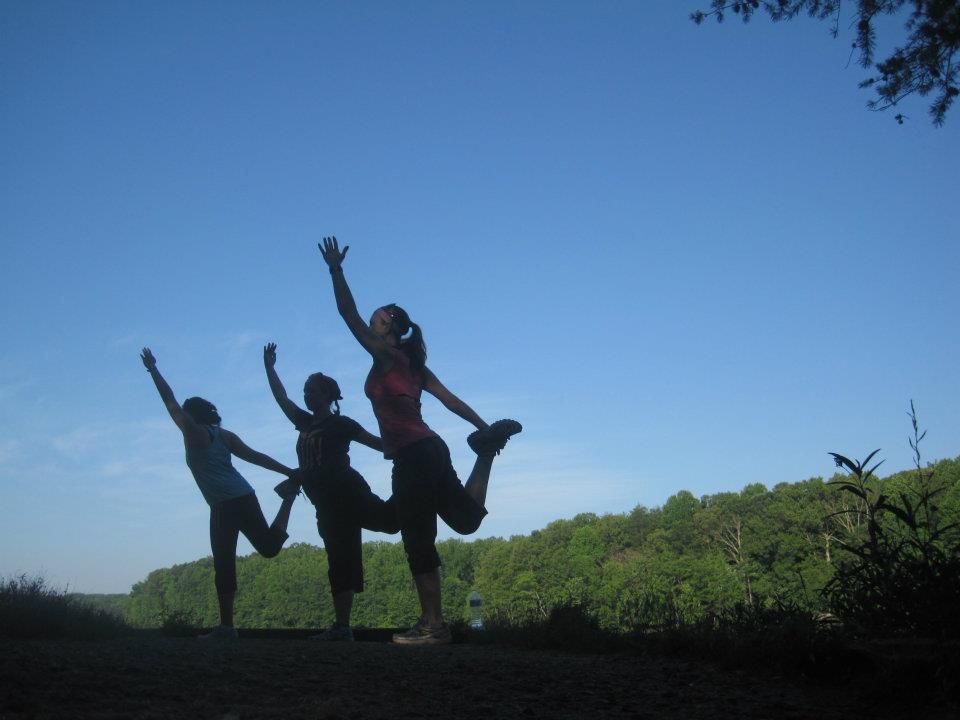 Leading yoga during a nature walk.