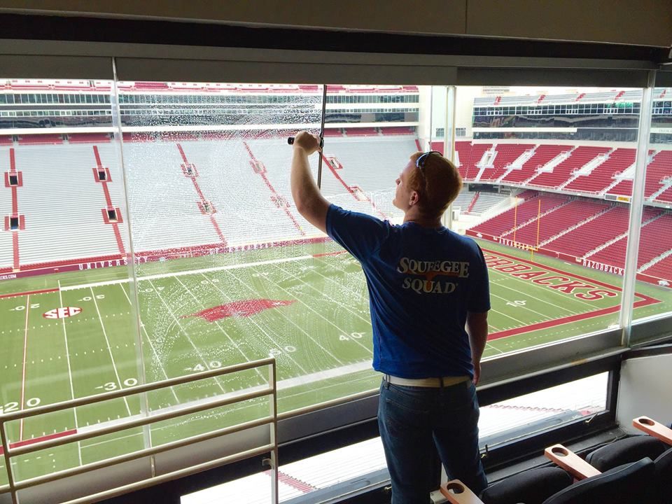 Our team cleaning Razorback Stadium