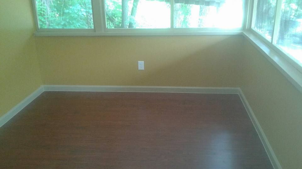 Removed wood paneling and replaced with drywall, a