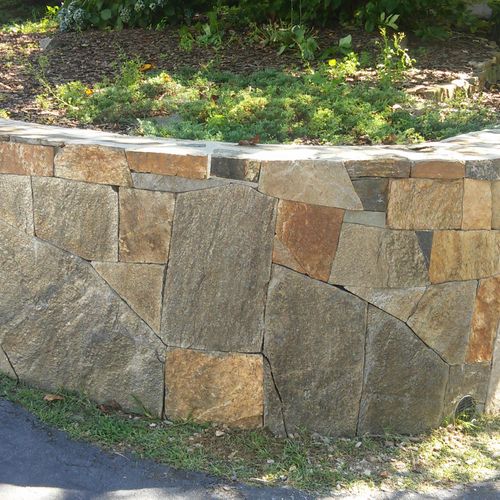 spit & cut retaining stone wall