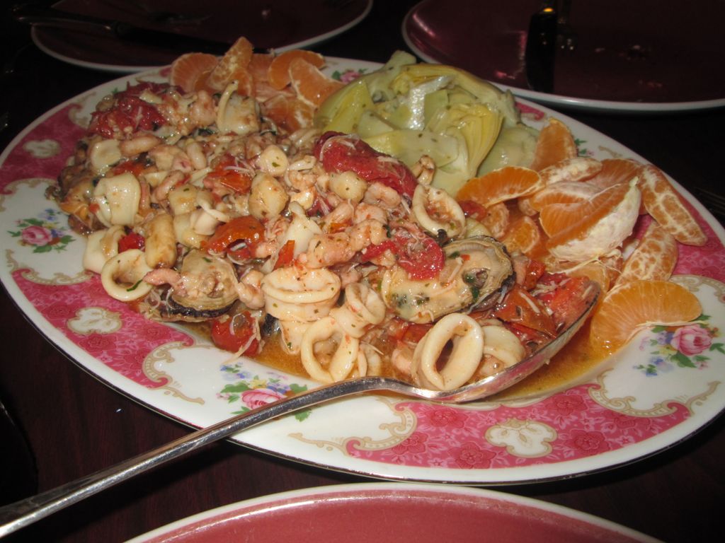 Seafood Salad with Tomatoes Clementines and artich