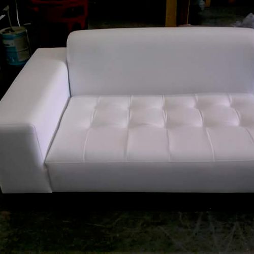 tufted couch done for a party planner company