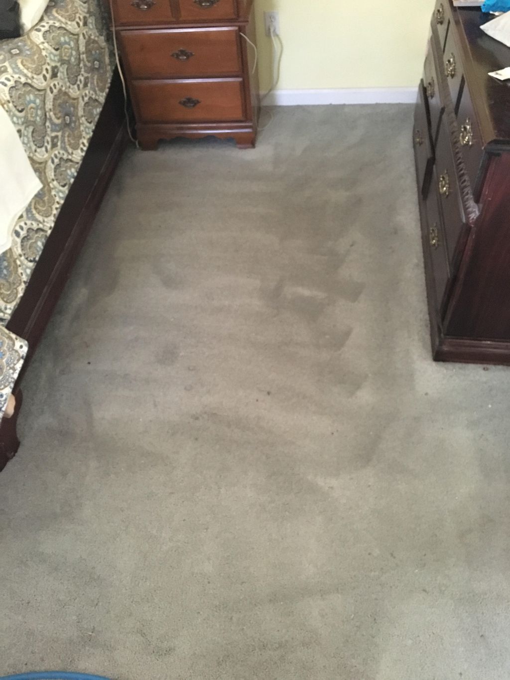 A small picture of a customers carpet before it wa