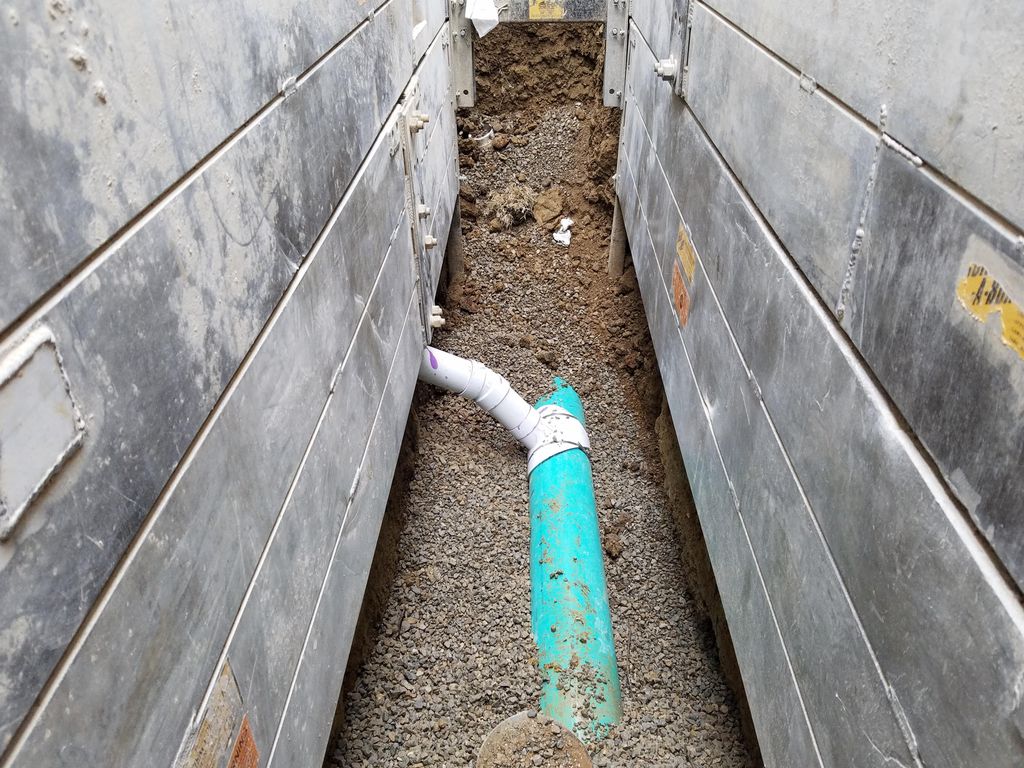 4" sewer tap on a new 8" main being installed. 