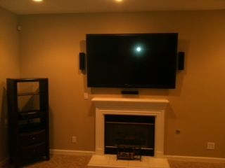 Mounted the TV above fireplace and installed the f