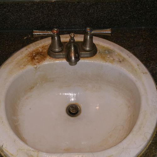 Bathroom sink before its cleaned