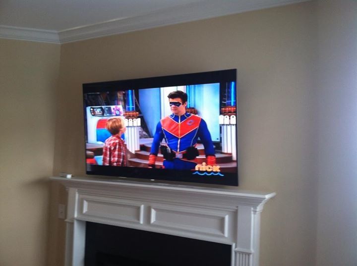 55" above a fireplace, 1" off of the mantel as the