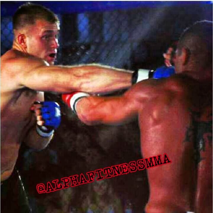 Bill Martin doing his thing inside the cage