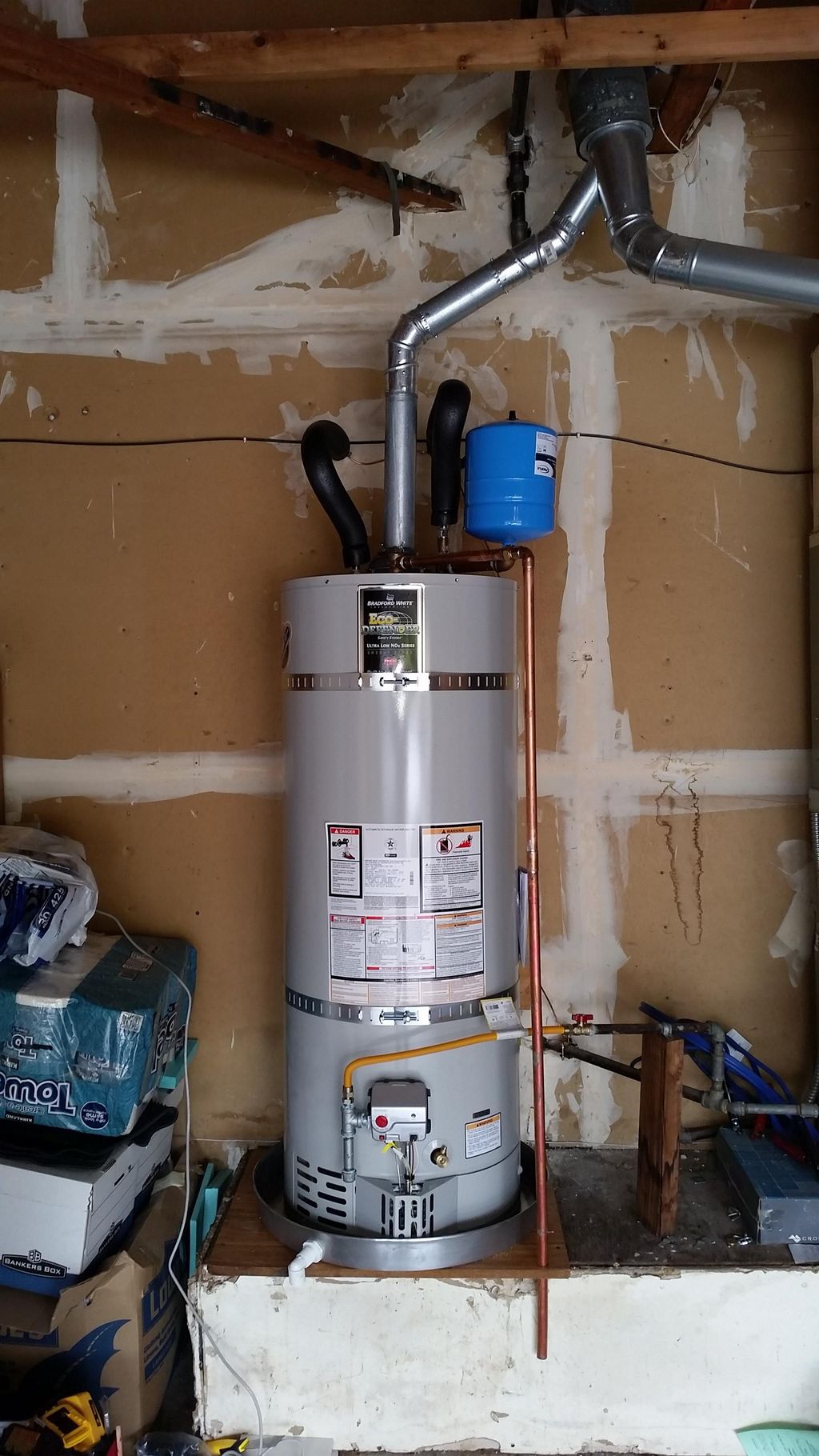 Water heater installed with expansion tank to prot