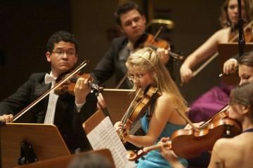 Leading the orchestra as Concertmaster