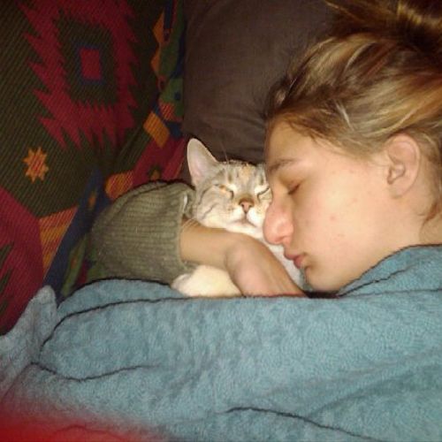 Tinkerbell and me, snoozing, a few years ago.