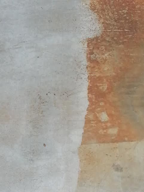 After:  removing rust stain on a driveway