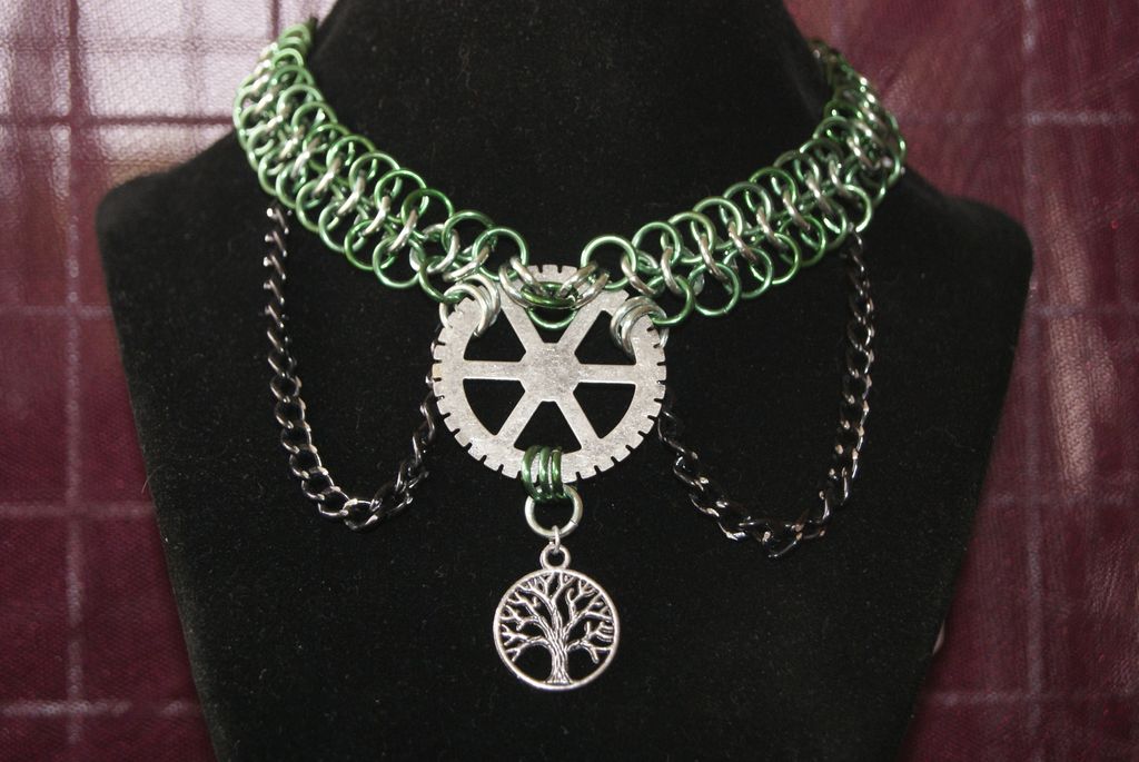 The chainmaille is made with anodized aluminum. Th