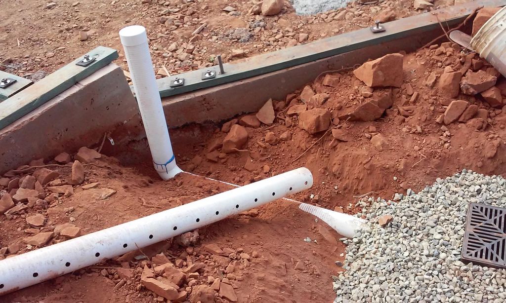 Drain lines applied, with gravel for better draina