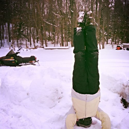 Headstanding in the snow.