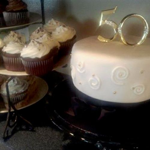 50th Anniversary cake single tier with cupcakes on