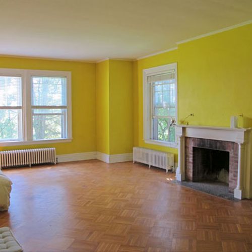 Light yellow walls, white ceiling and trim.