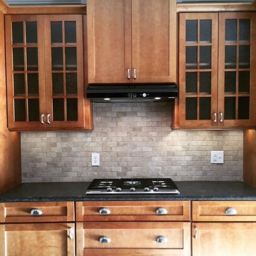 Schuler Cabinets with honed granite.