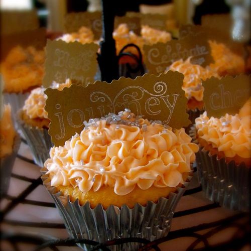 { Vanilla Cupcake with Peach Frosting }
