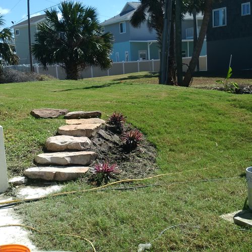 Lawn mowing, installed stone steps, planting, top 
