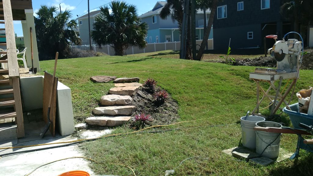Lawn mowing, installed stone steps, planting, top 