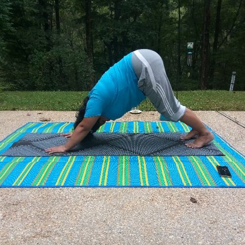 Individual Yoga Instruction (Client is in downward