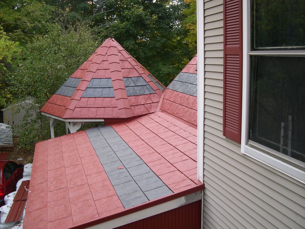 Smooth painted metal shingle