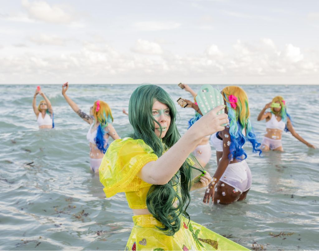 Was hired to photograph performance artist Kate Du