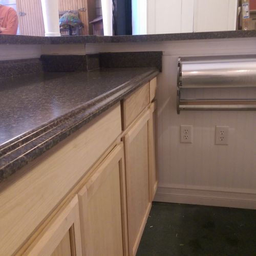 cabinetry instalation with more custom countertops