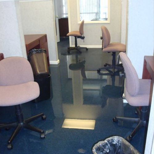 Water damage caused by toilet in commercial buildi