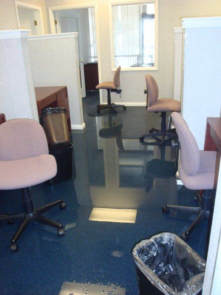 Water damage caused by toilet in commercial buildi
