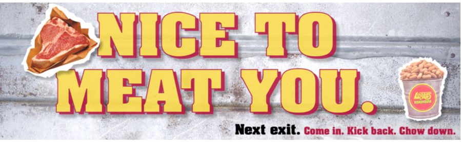 Billboard for Logan's Roadhouse.