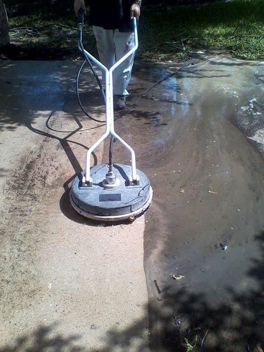 Using a surface washer on a driveway makes a huge 