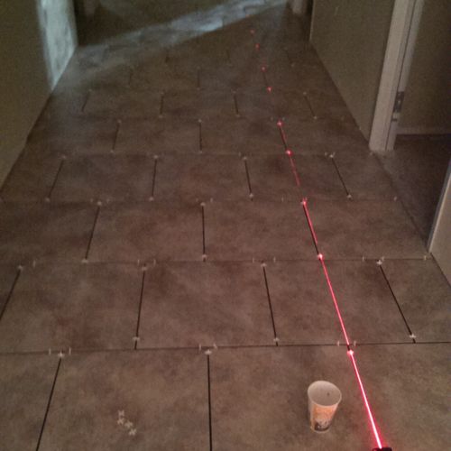 Using a laser assures that the tiles are lined up 