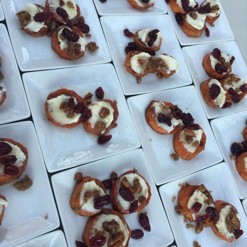 Baked sweet potato rounds with goat cheese, honey,