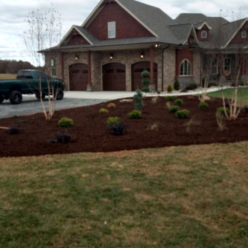 Finished up the edging, mulching and watering.