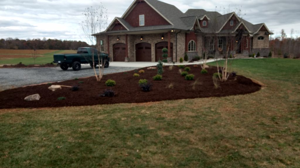 Finished up the edging, mulching and watering.