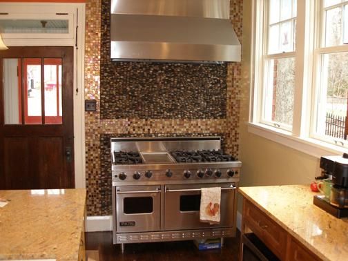 Completed Project Tiled With River Rock And Glass 