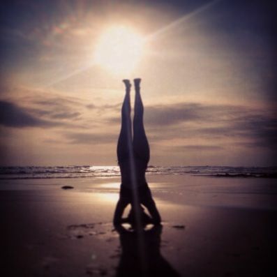 Headstand at sunset in Bali